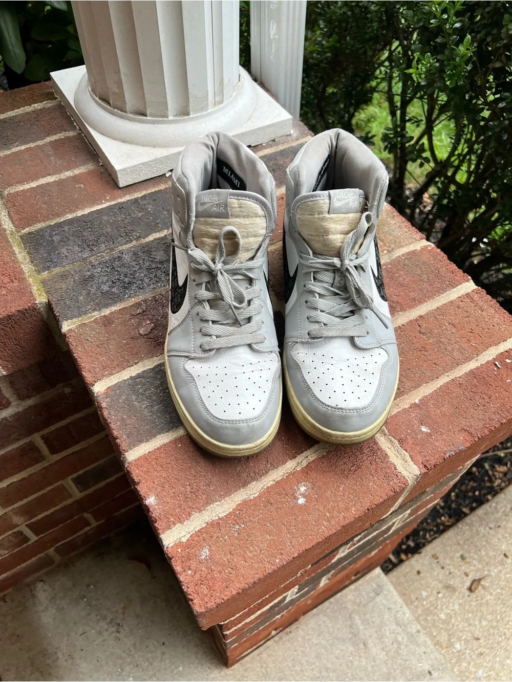 Jordan High-Top Sneakers in Light Gray with Black Swoosh